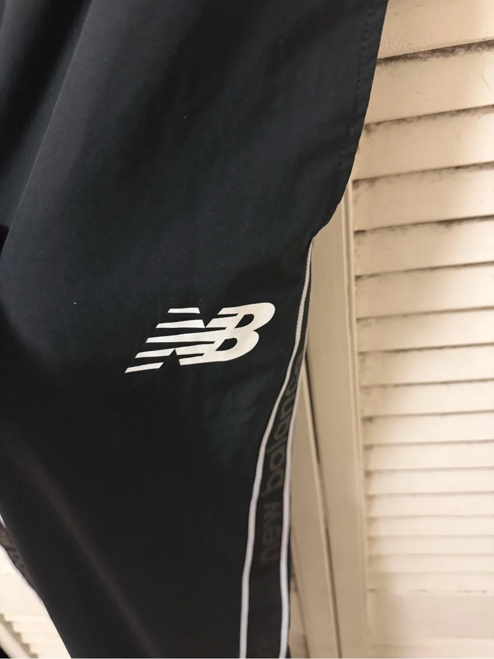 New Balance mens Black Athletic Track Pants